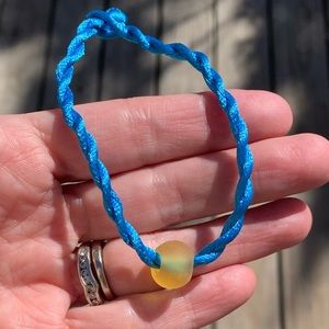 Blue bracelet with Yellow Sea Bead